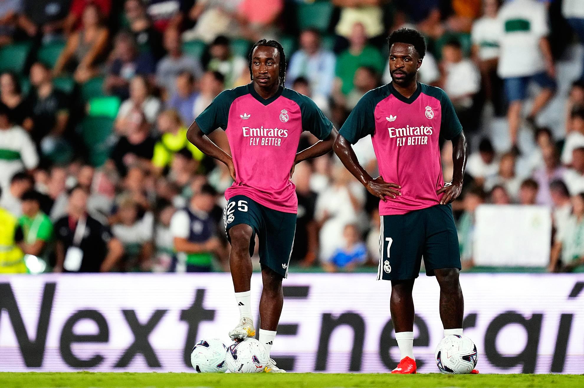 Diomandé y Vinicius en la previa de un partido del Madrid. NurPhoto via Getty Images