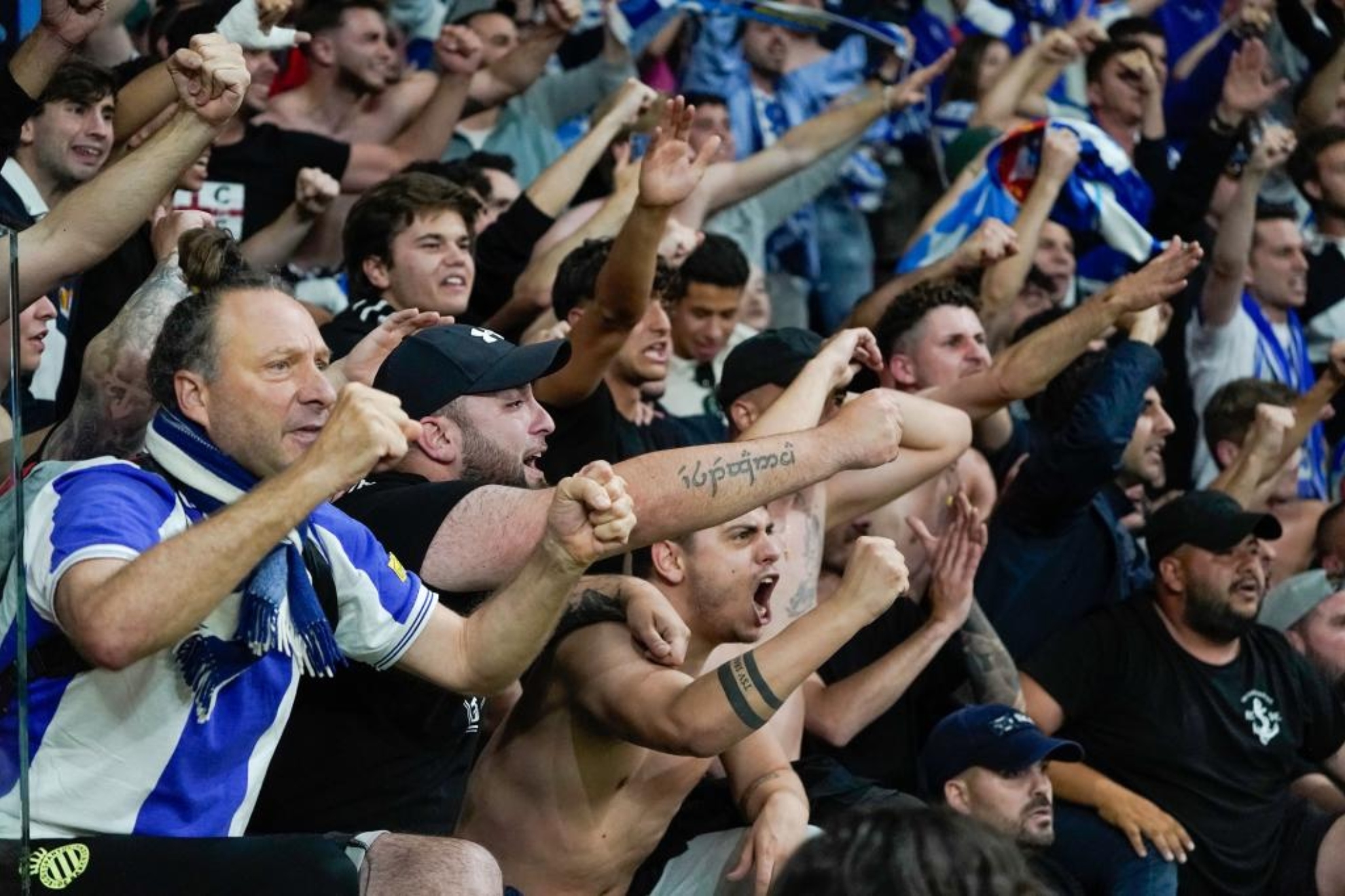 Aficionados del Espanyol, en El Molinón animando a su equipo en la ida.