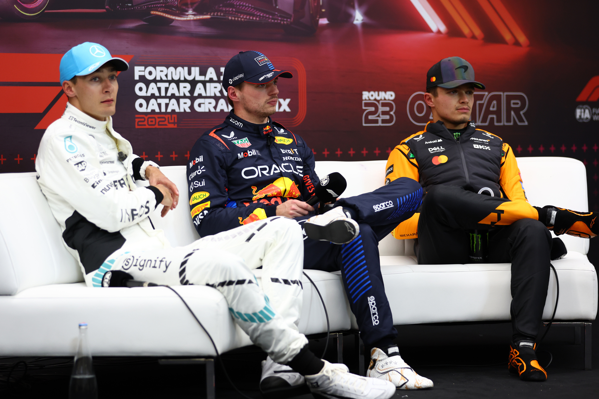Lando Norris, George Russell y Max Verstappen en la rueda de prensa de la polémica