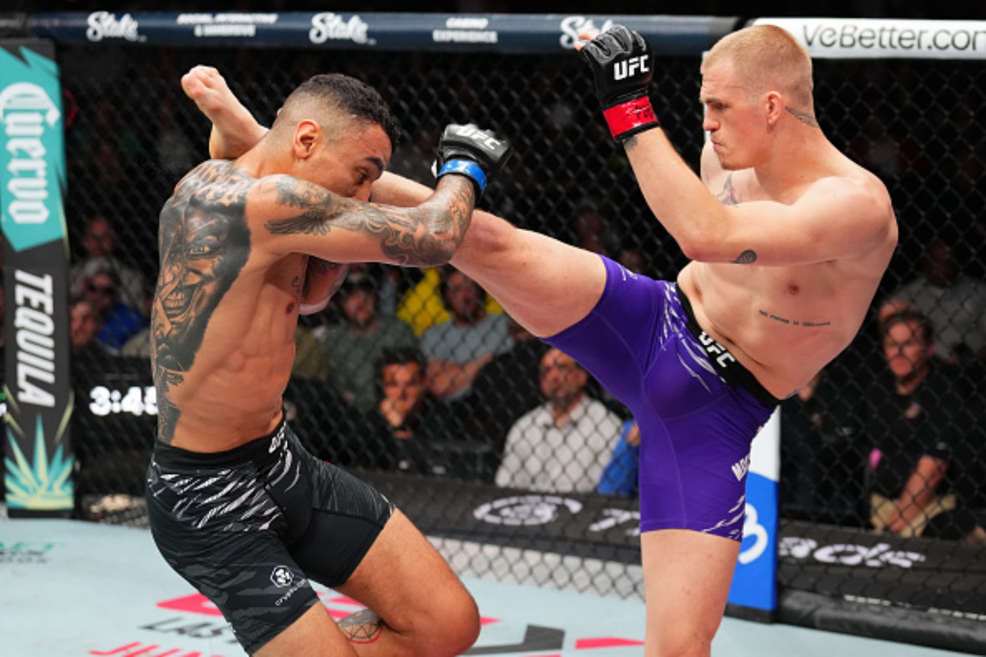 Ian Garry and Carlos Prates during their fight in Kansas City.