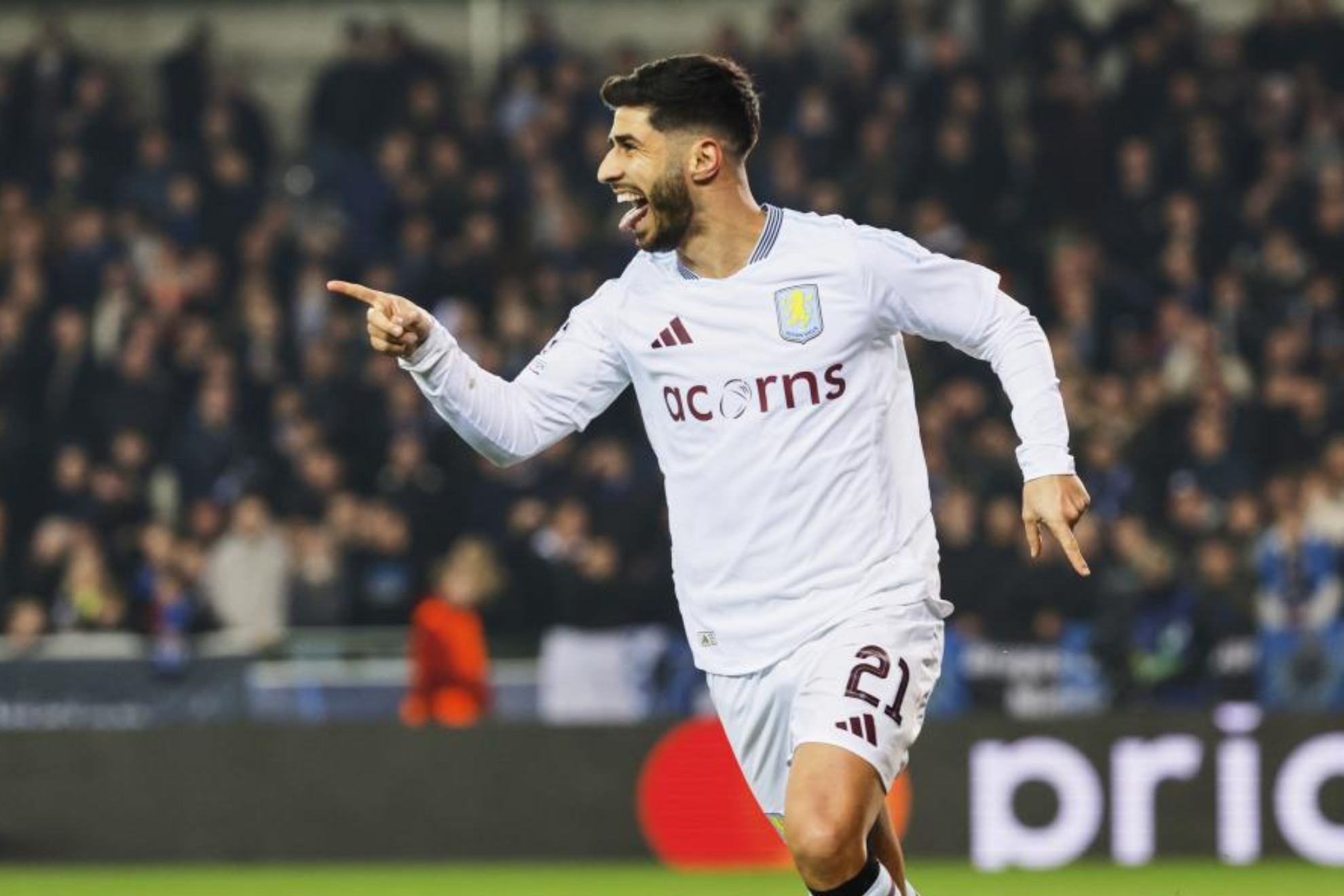 Marco Asensio celebra un gol en el partido de ida de los octavos de final de la Champions.
