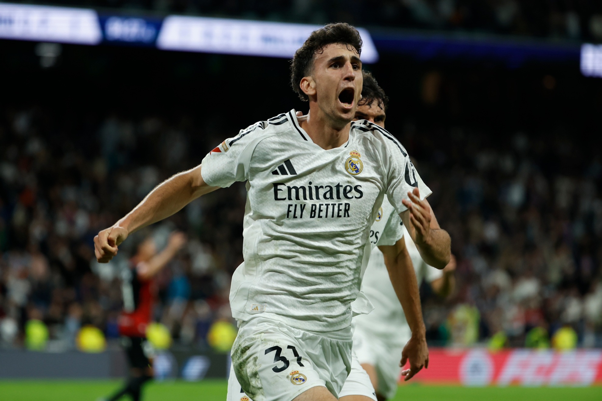 Jacobo Ramón celebra un gol con el Real Madrid.