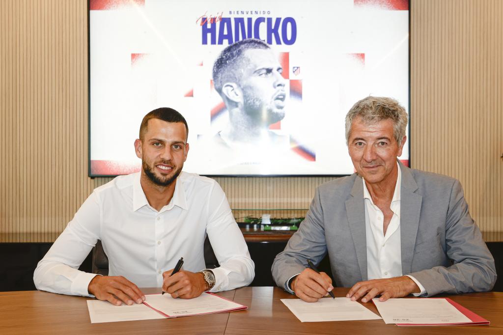 Hancko junto a Miguel Ángel Gil.