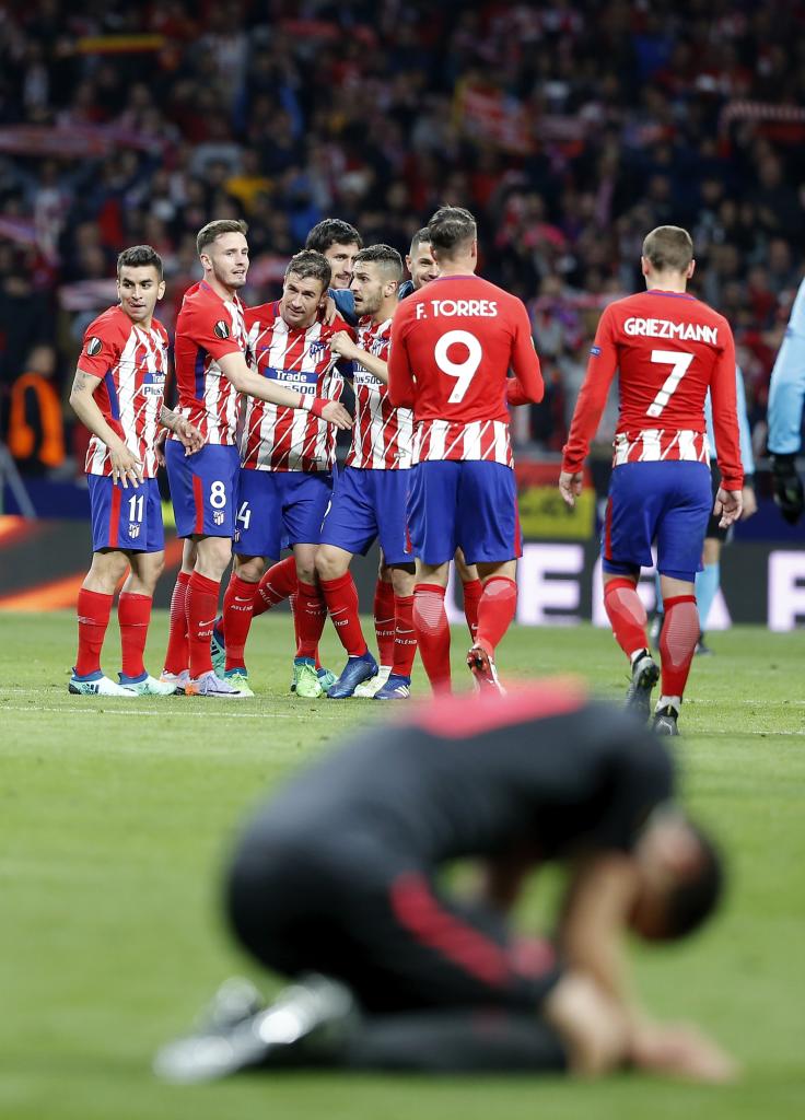 Celebration of the Atlético players after eliminating Arsenal in the Europa League.