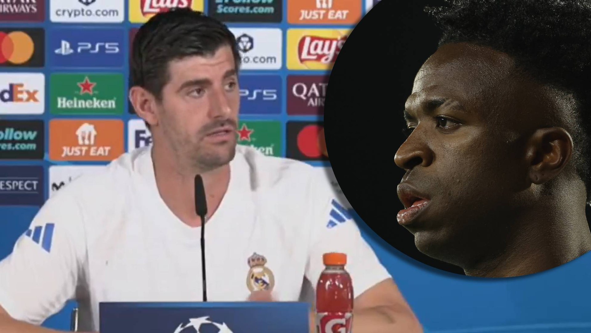 Courtois, con Vinicius.