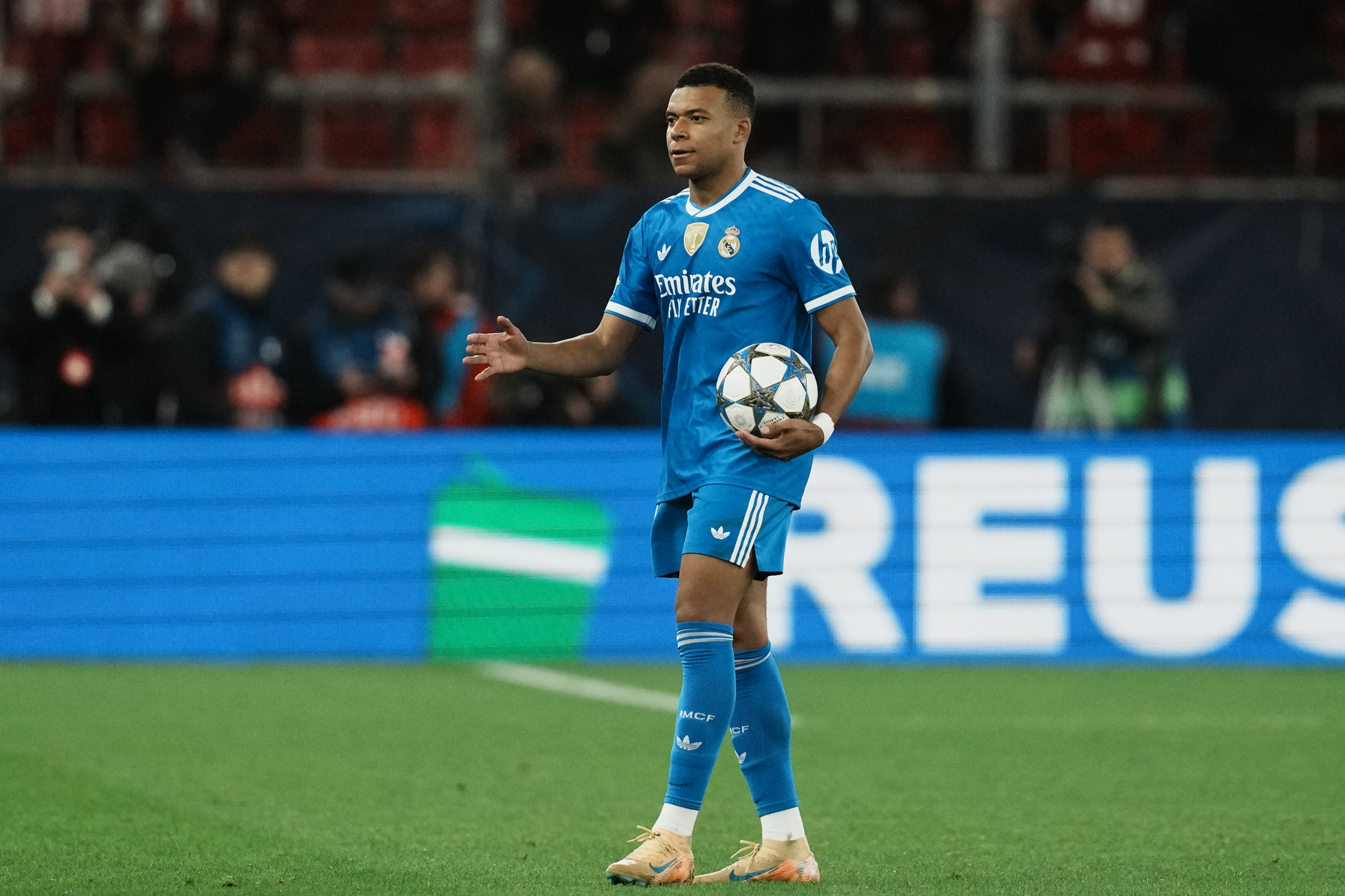 Real Madrid's Kylian Mbappe takes the ball at the end of the Champions League opening phase soccer match between Olympiacos and Real Madrid in Piraeus port, near Athens, Greece, Wednesday, Nov. 26, 2025. (AP Photo/Thanassis Stavrakis)