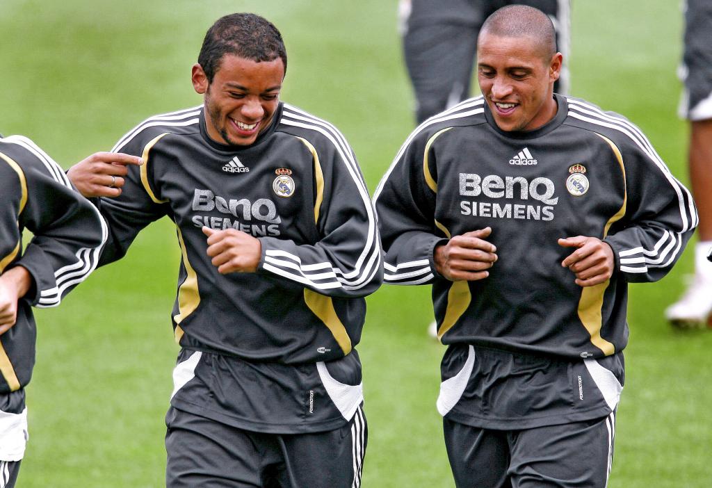 Marcelo y Roberto Carlos en un entrenamiento con el Madrid en 2006.