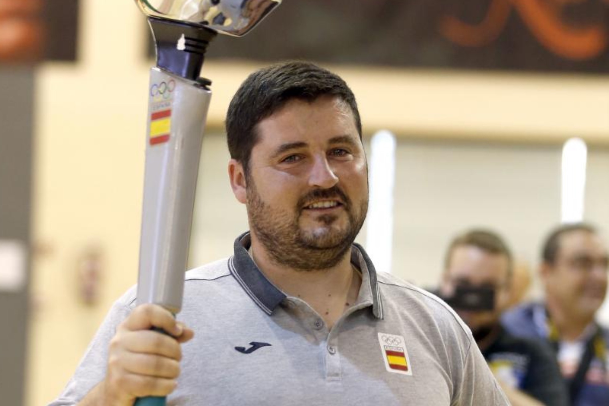 David Cal con la antorcha olímpica