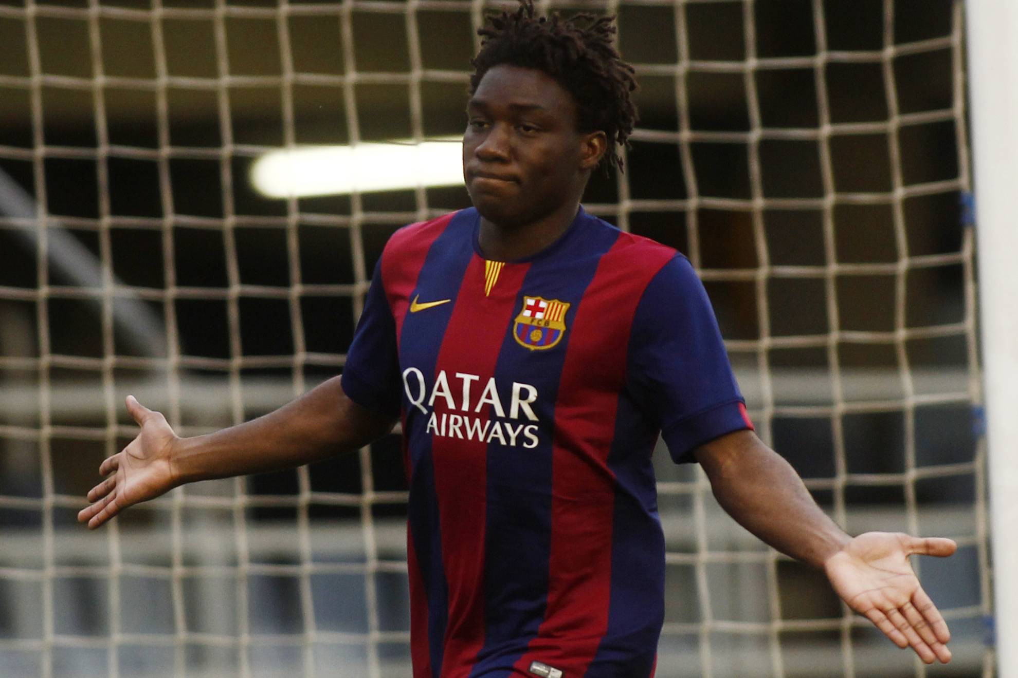 Dongou celebrates a goal for Barca Atletic.