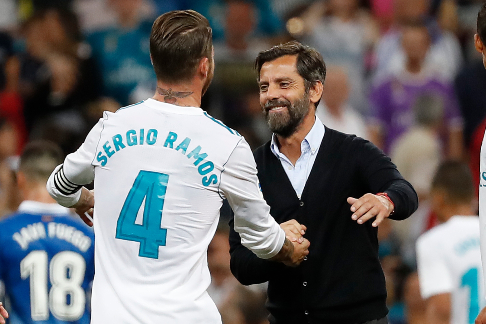 Quique Sánchez Flores y Sergio Ramos en una imagen de 2017.