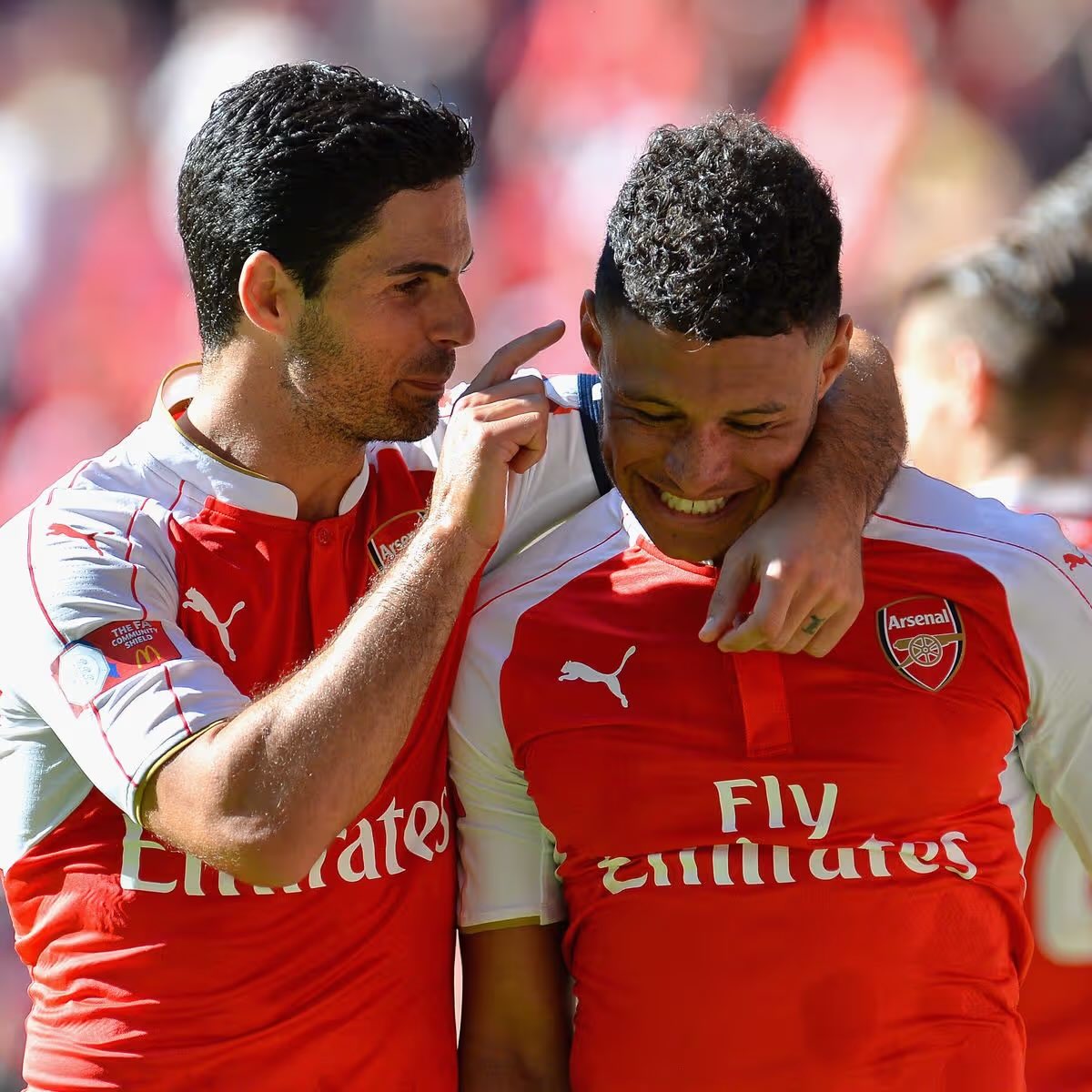 Arteta y Oxlade-Chamberlain