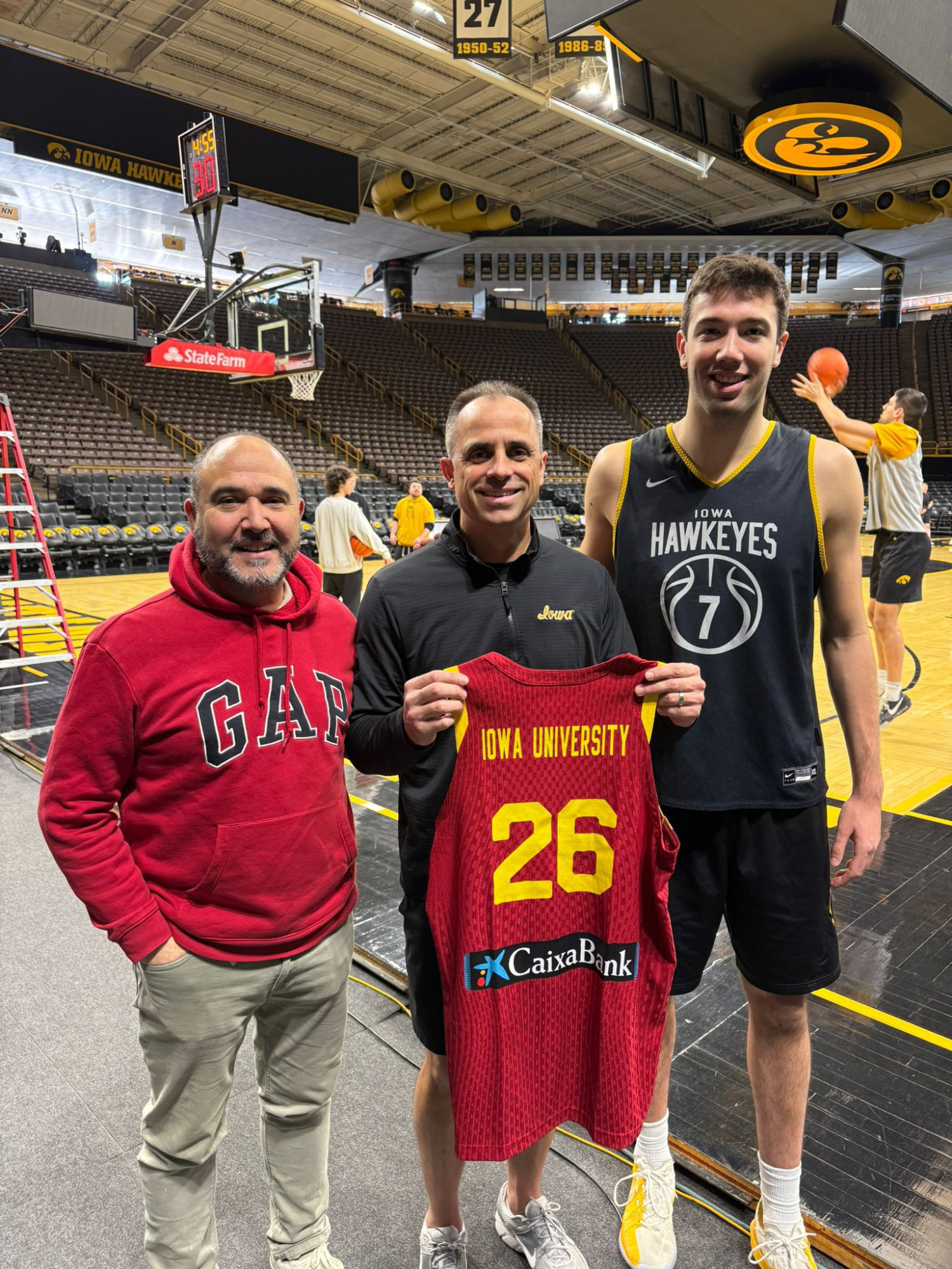 Mateo, MacCollum, entrenador de Iowa, y Folgueiras..