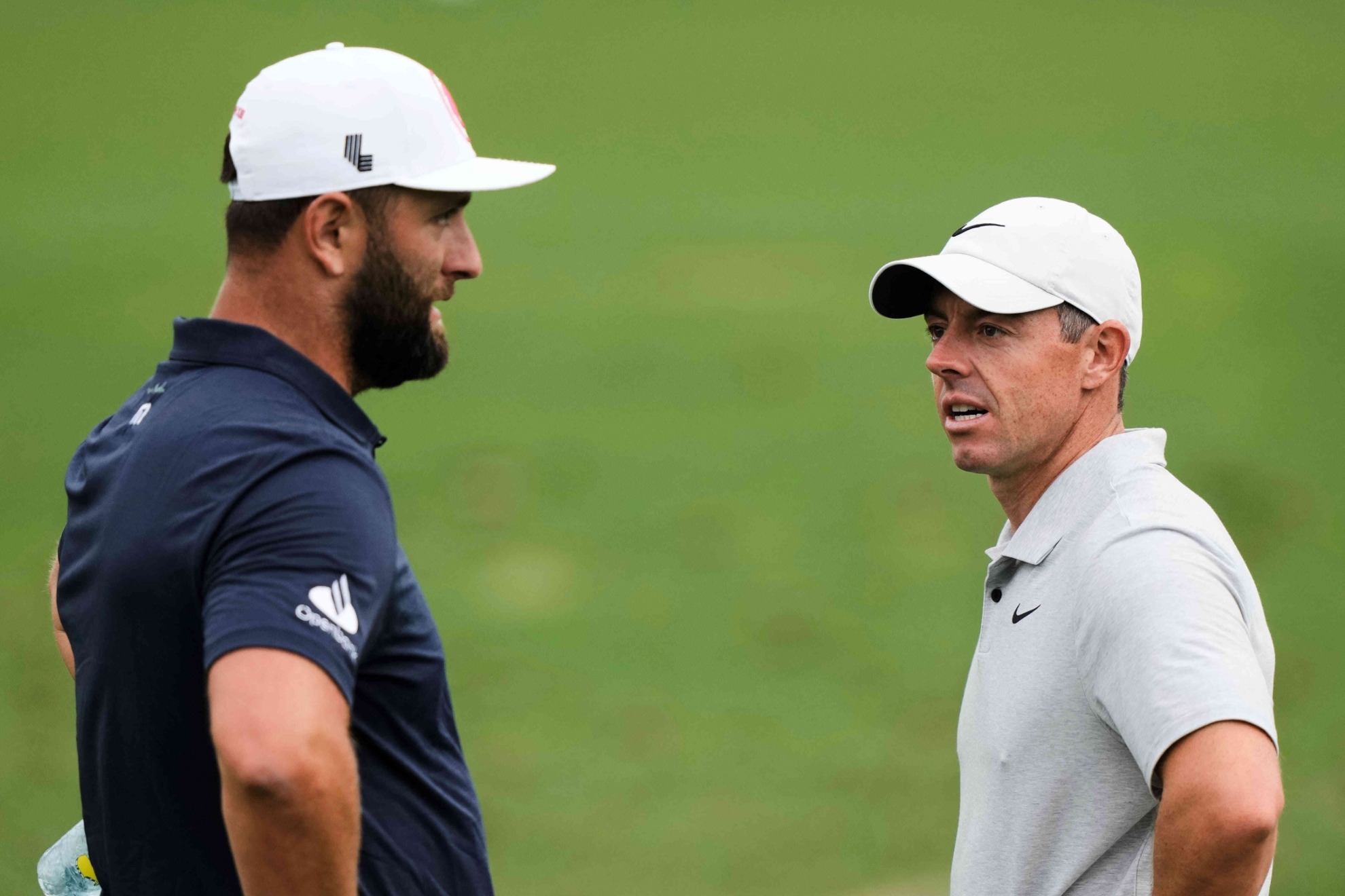 Jon Rahm y Rory McIlroy en Augusta en 2024.