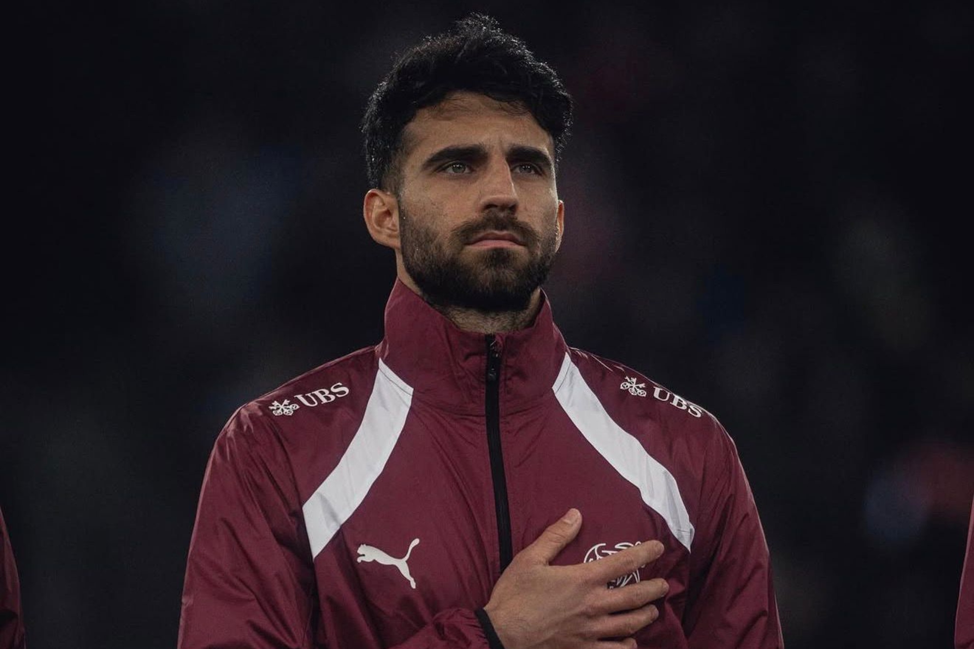 Comert durante un partido con la selección.