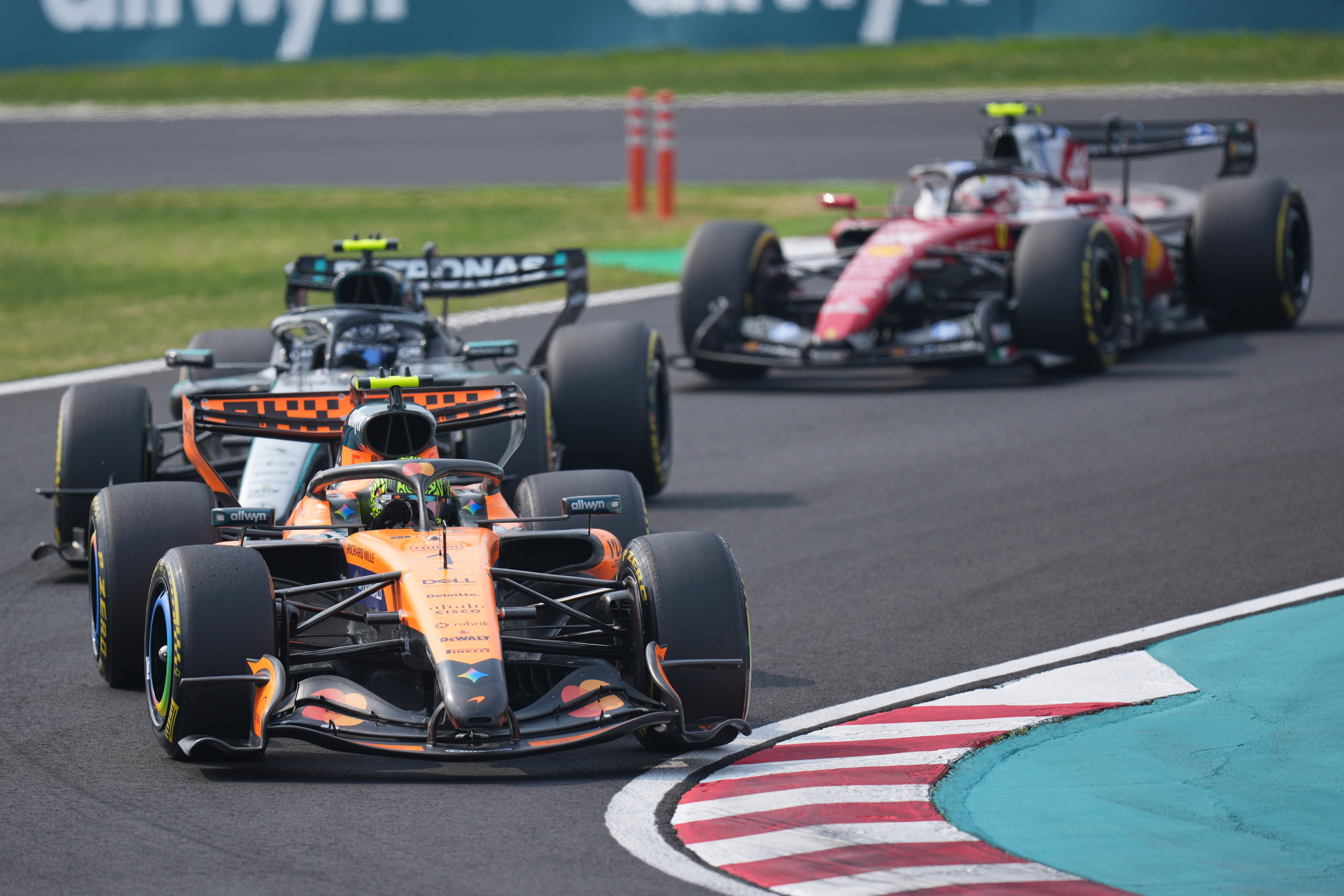McLaren driver Lando Norris of Britain leads Mercedes driver Kimi Antonelli of Italy during the Japanese Formula One Grand Prix at Suzuka in central Japan, Sunday, March 29, 2026. (AP Photo/Hiro Komae) CORRECTION: Drivers name corrected to Lando Norris
