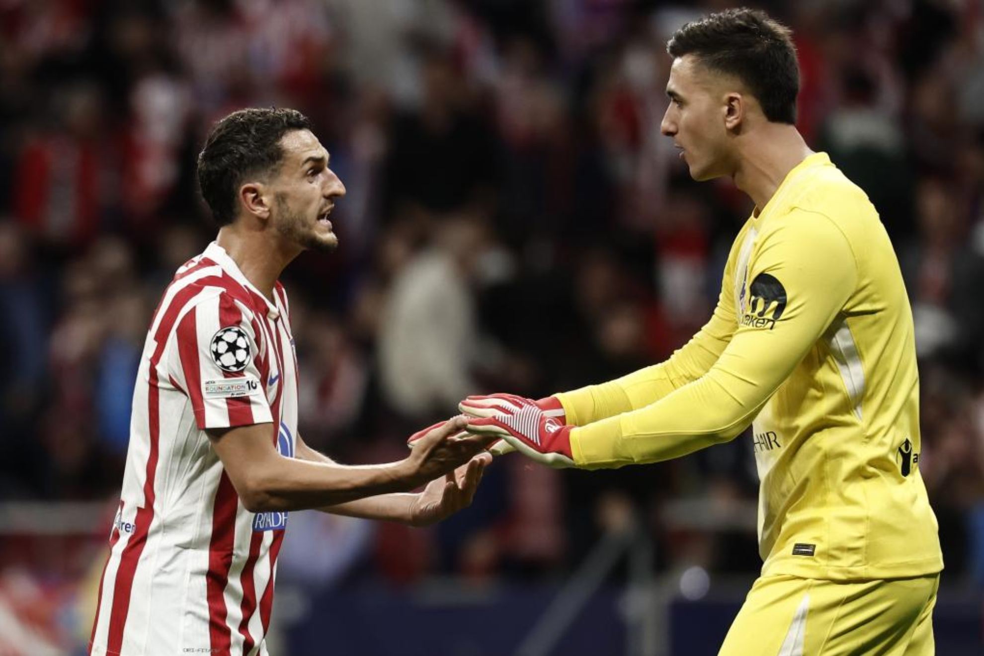 Koke con Musso.