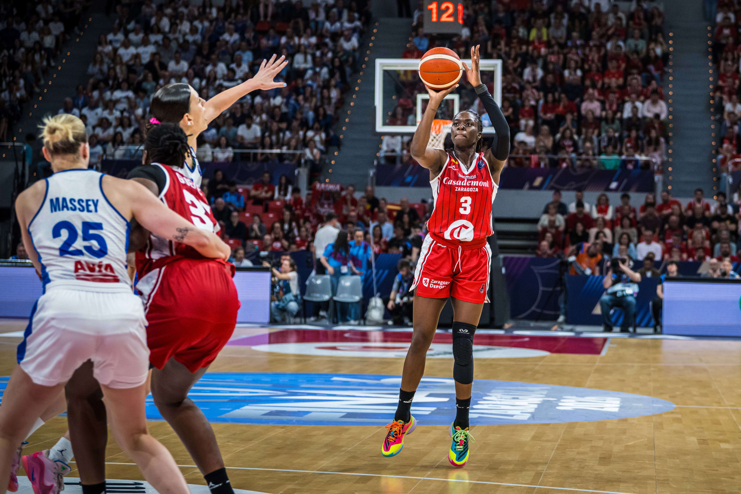 Bankole shoots a basket.