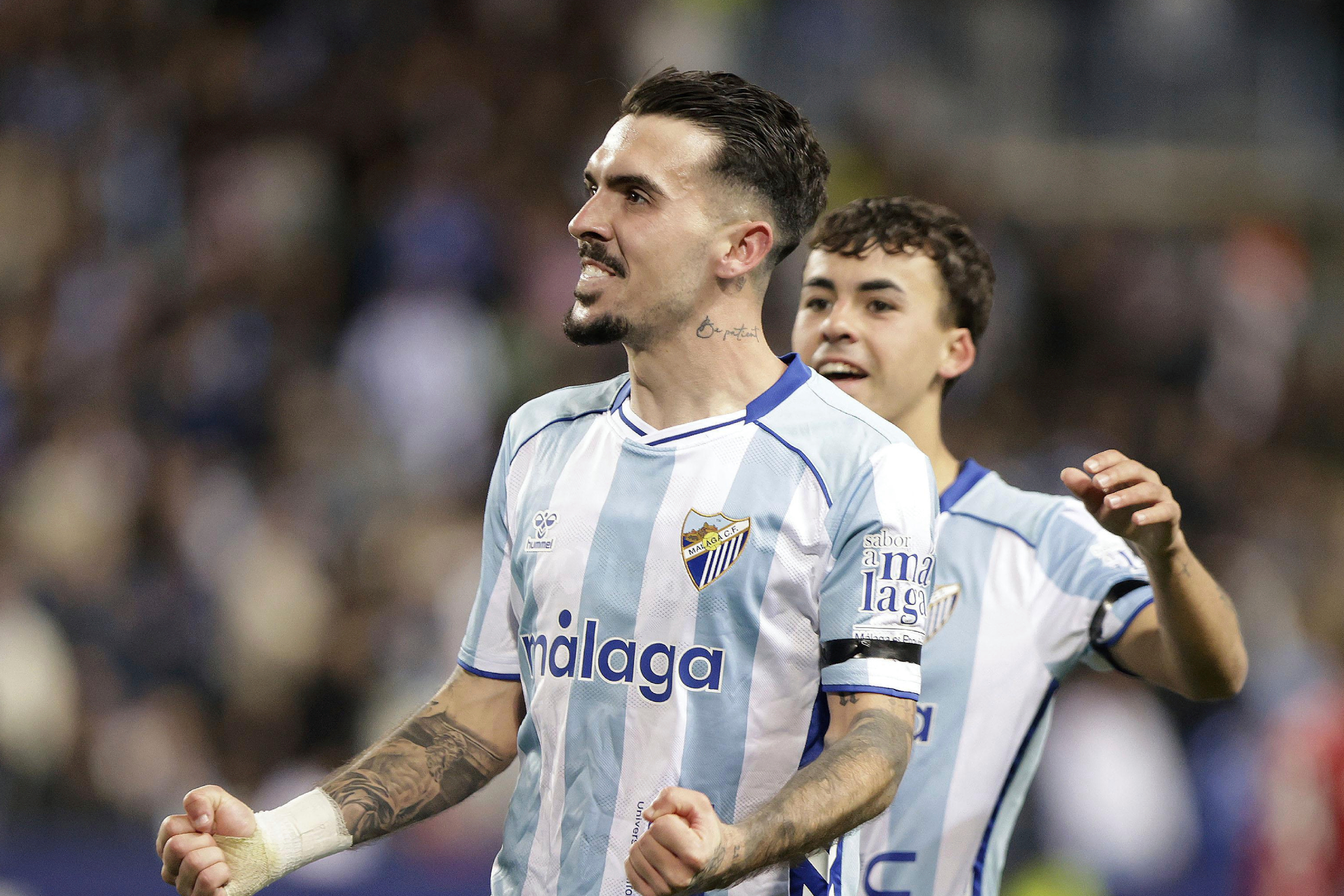 Joaquín Muñoz, celebrando un gol con el Málaga.