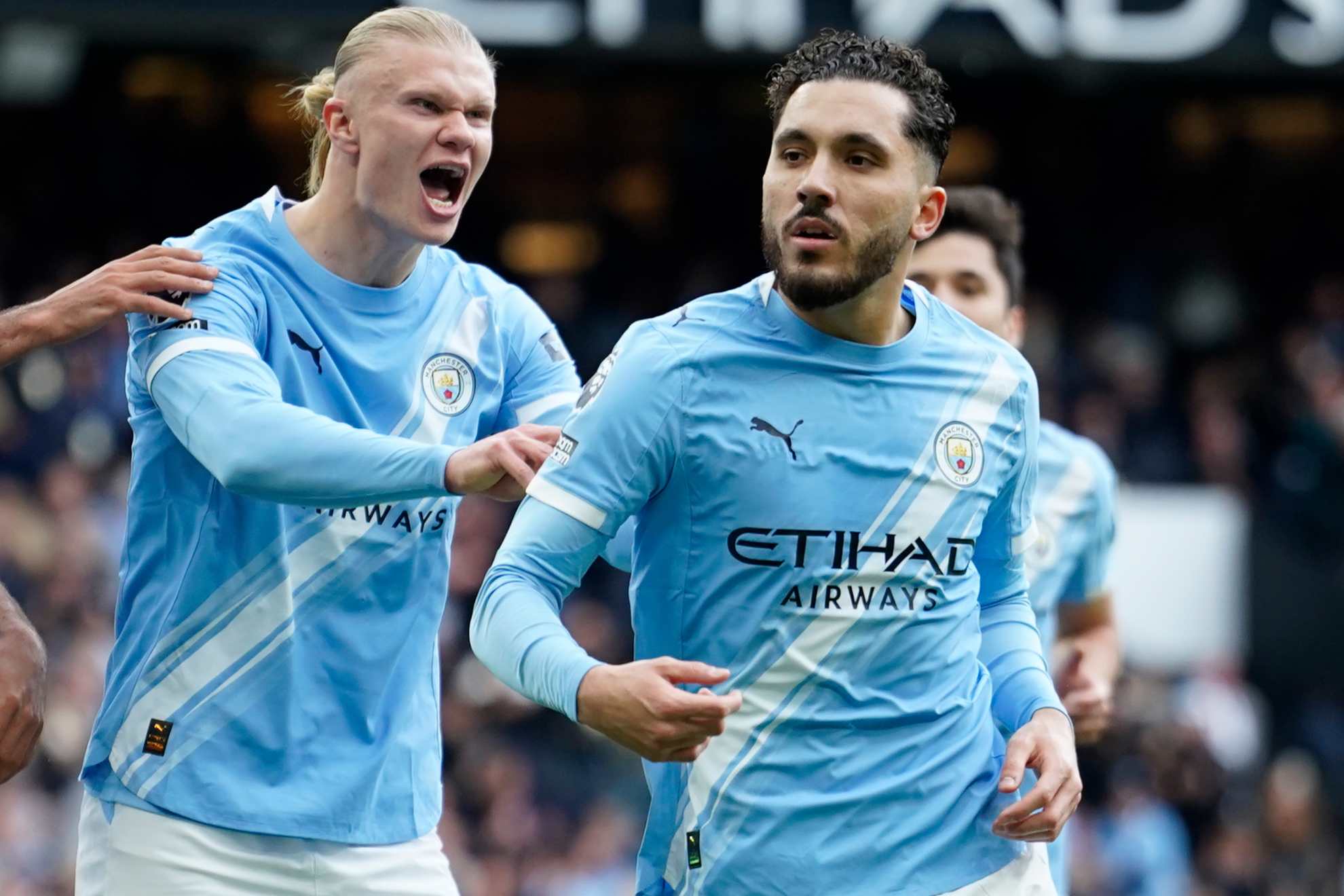 Rayan Cherki celebrates his goal against Arsenal