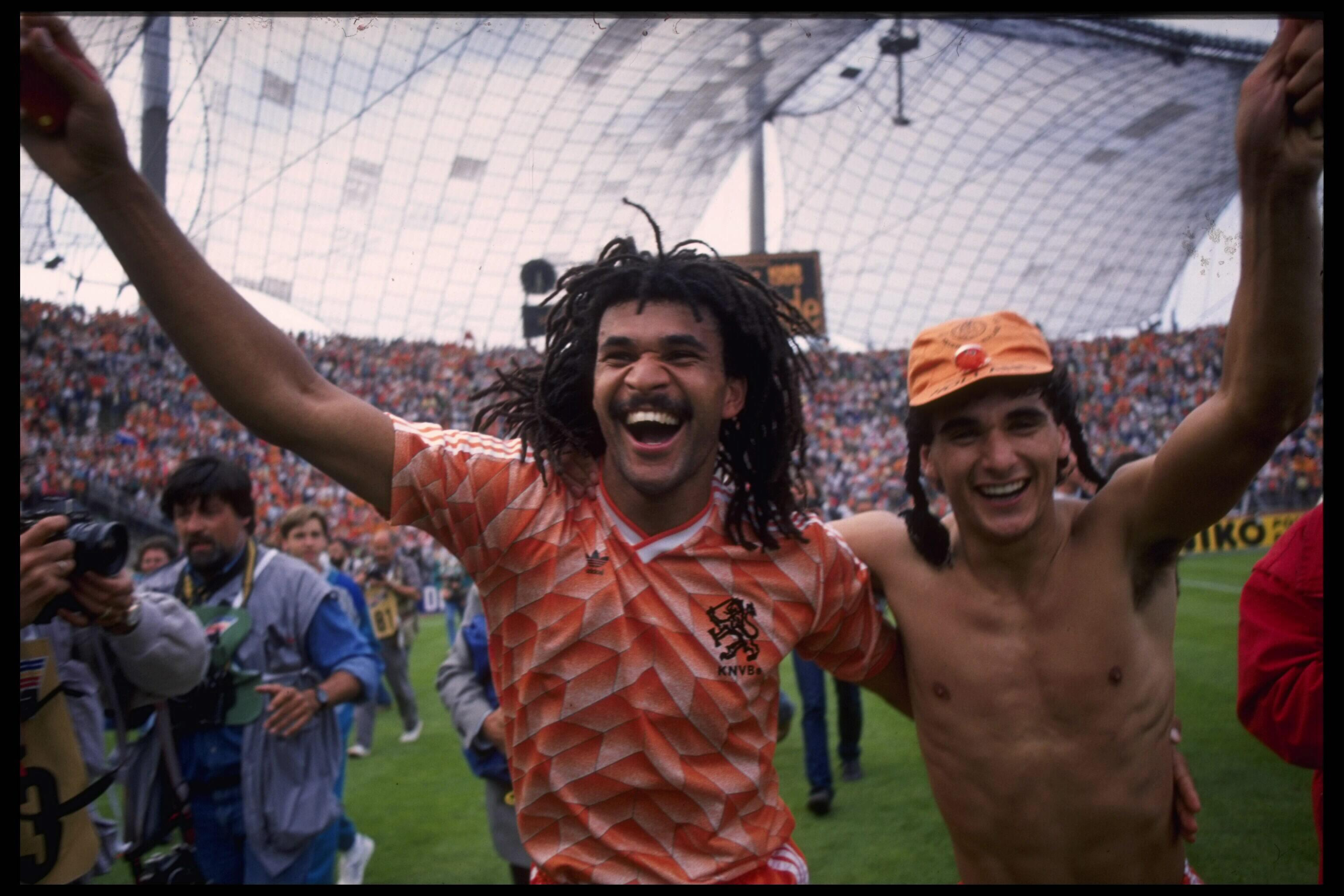 Gullit celebrates with a teammate the Netherlands' victory in the 1988 Euro Cup.