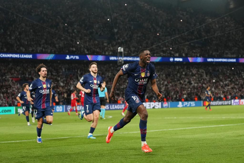 PSG's Ousmane Dembele celebrates after scoring his side's third goal during a Champions League semifinal, first leg, soccer match between Paris Saint-Germain and Bayern Munich in Paris, Tuesday, April 28, 2026. (AP Photo/Aurelien Morissard)