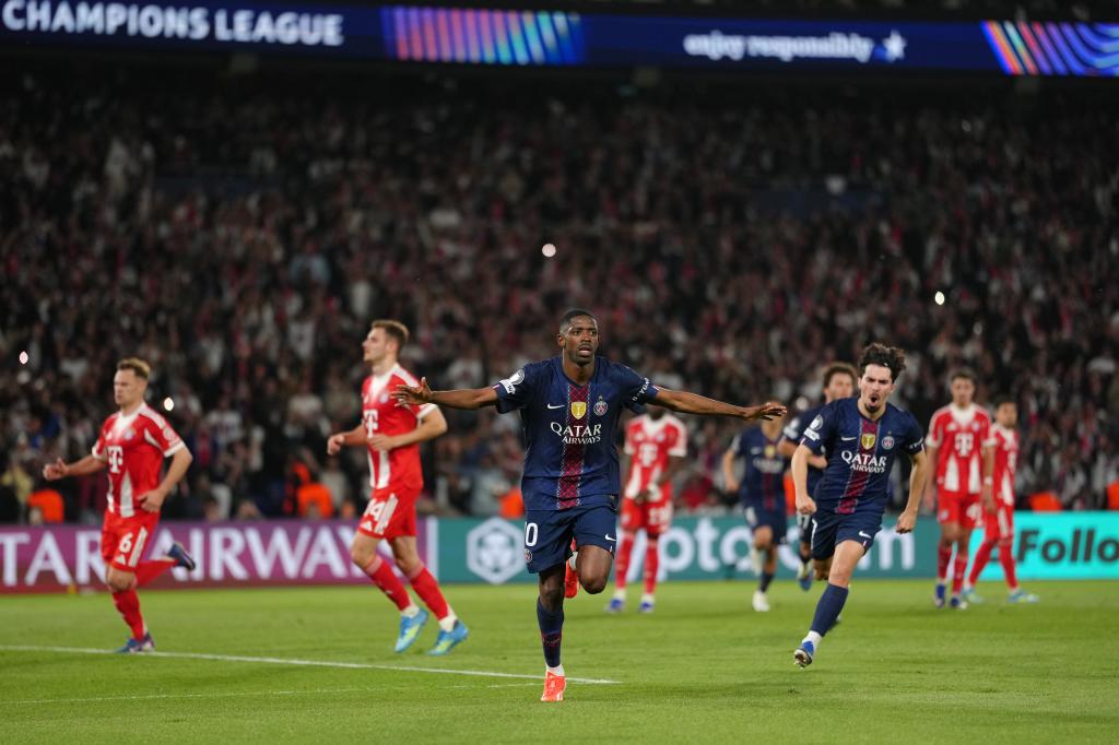 PSG's Ousmane Dembele celebrates after scoring his side's third goal during a Champions League semifinal, first leg, soccer match between Paris Saint-Germain and Bayern Munich in Paris, Tuesday, April 28, 2026. (AP Photo/Aurelien Morissard)