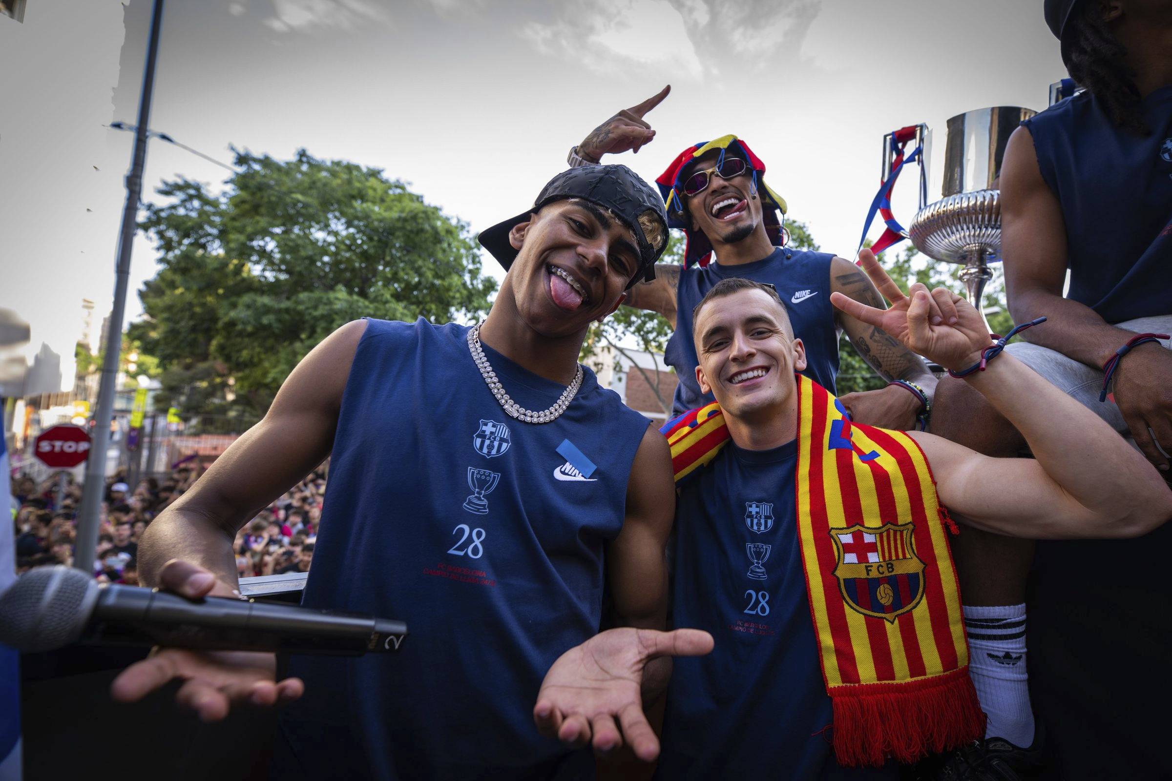 Barcelona players celebrating the title on the bus.