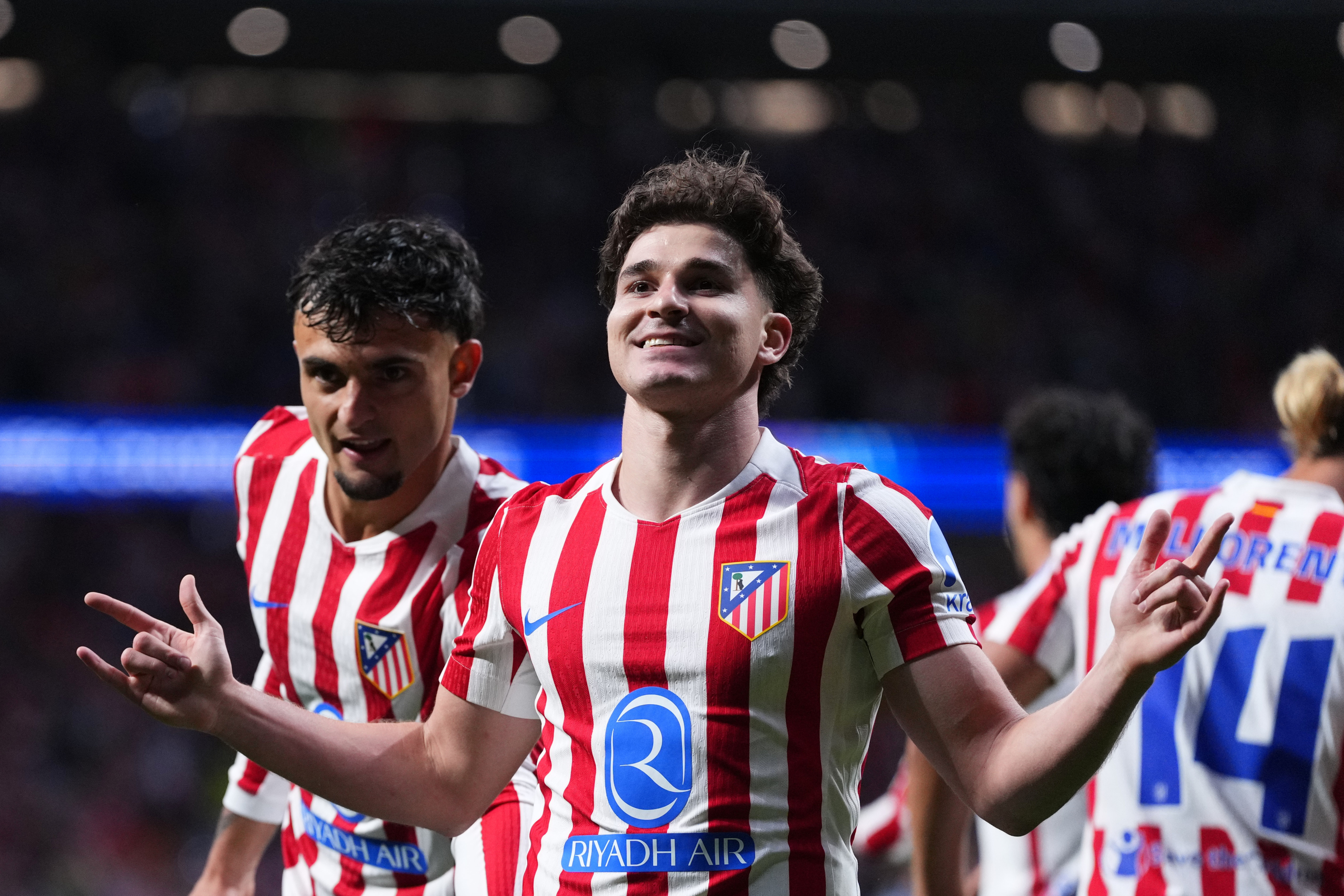 Atletico Madrid's Julian Alvarez, 2nd right, celebrates after scoring his sides first goal during a Champions League semifinal, first leg, soccer match between Atletico Madrid and Arsenal in Madrid, Spain, Wednesday, April 29, 2026. (AP Photo/Manu Fernandez)