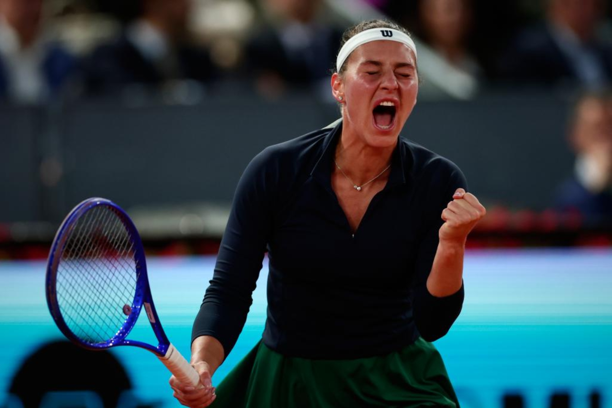 Kostyuk celebra un punto