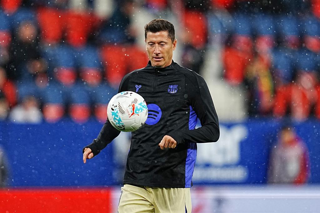 Barcelona's Robert Lewandowski controls the ball as he warms-up before a Spanish La Liga soccer match between Osasuna and Barcelona in Pamplona, Spain, Saturday, May 2, 2026. (AP Photo/Miguel Oses)
