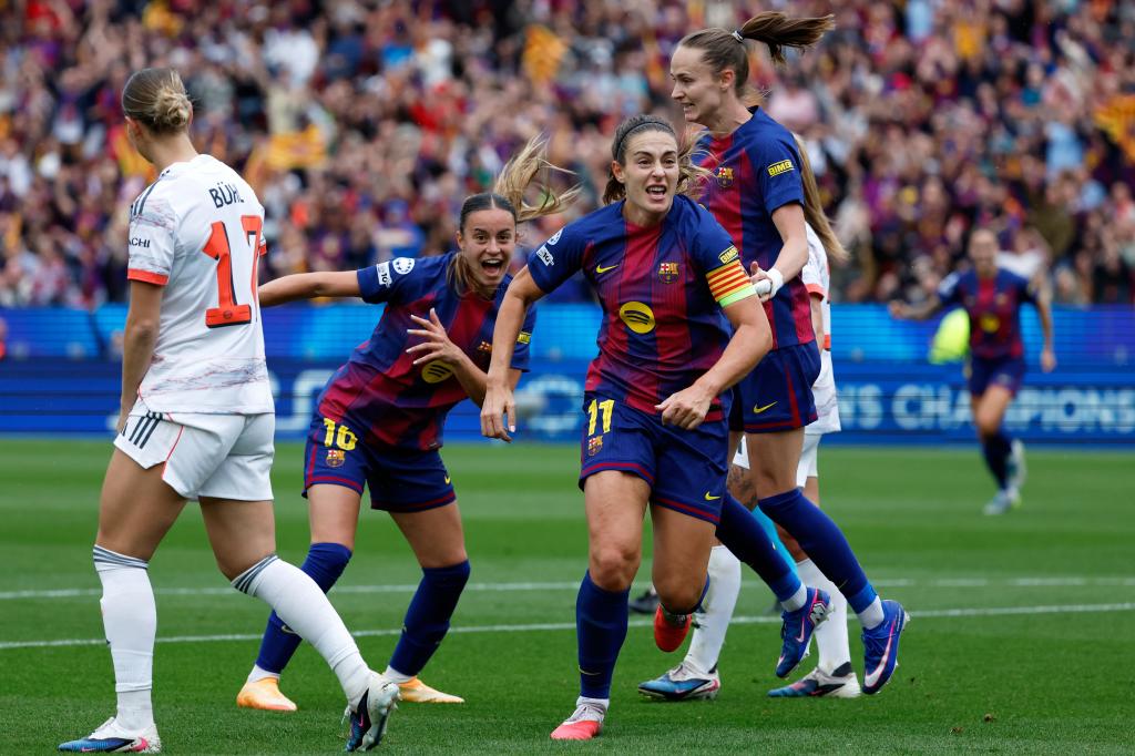 Barcelona's Alexia Putellas celebrates after scoring her side's second goal during the women's Champions League semifinal soccer match between FC Barcelona and FC Bayern Munich in Barcelona, Spain, Sunday, May 3, 2026. (AP Photo/Joan Monfort)