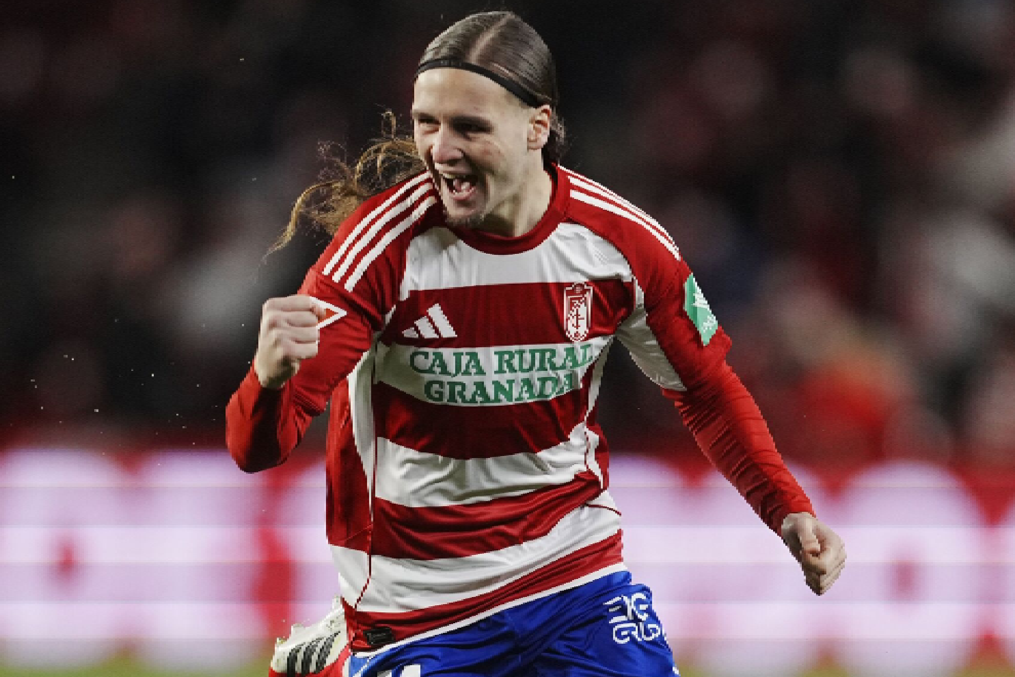 Izan González celebra un gol anotado con el Granada