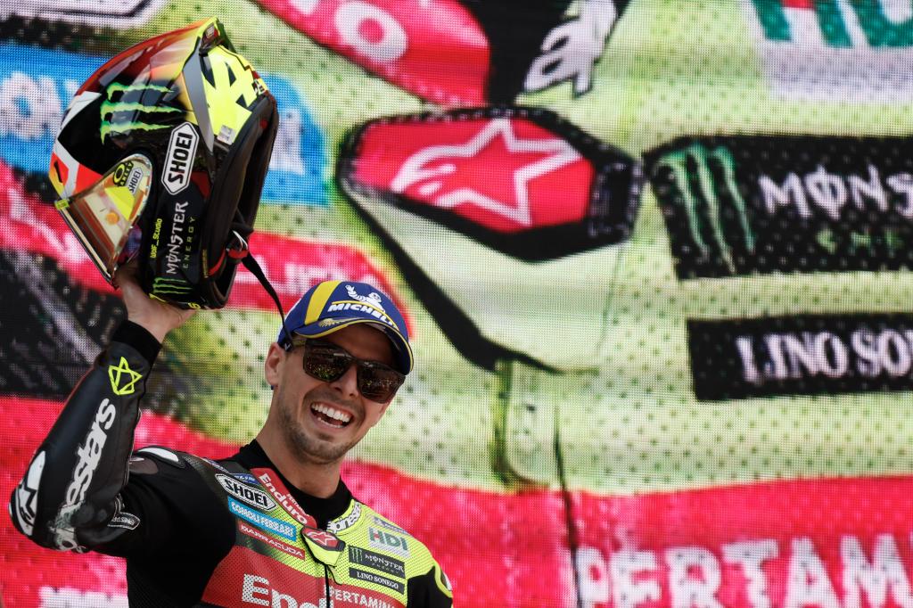 Race winner Italian rider Fabio Di Giannantonio of the Pertamina Enduro VR46 Racing Team celebrates on the podium after the MotoGP race of the Grand Prix of Catalunya in Montmelo, near Barcelona, Spain, Sunday, May 17, 2026. (AP Photo/Joan Monfort)