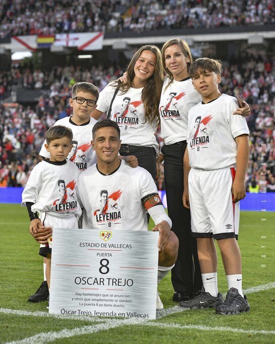 Trejo and his family next to the plaque.
