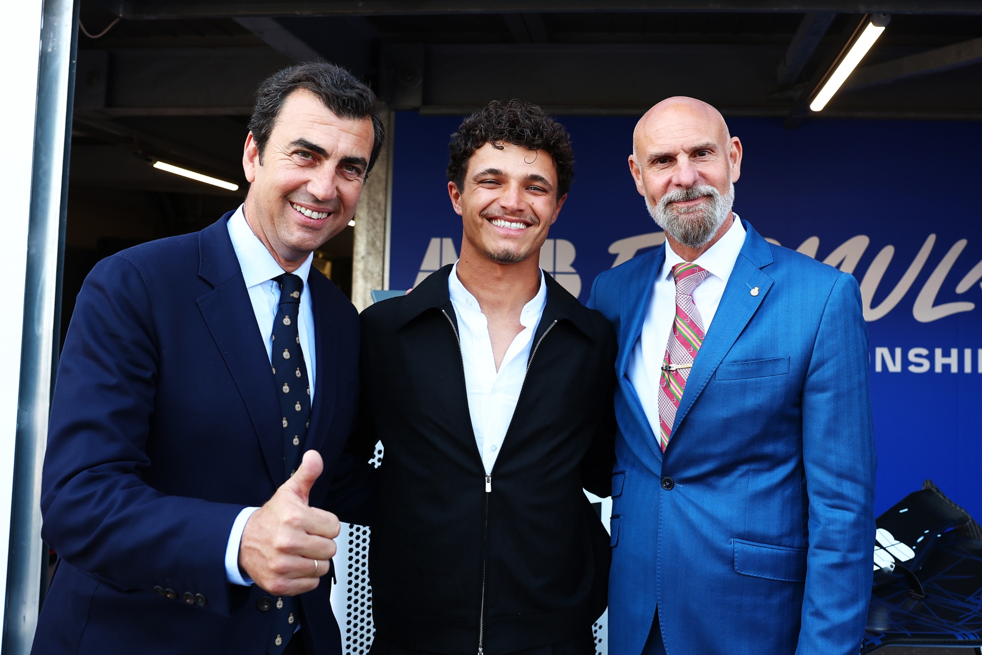 Norris, junto a los 'jefes' de la Fórmula E, Alberto Longo y Jeff Dodds