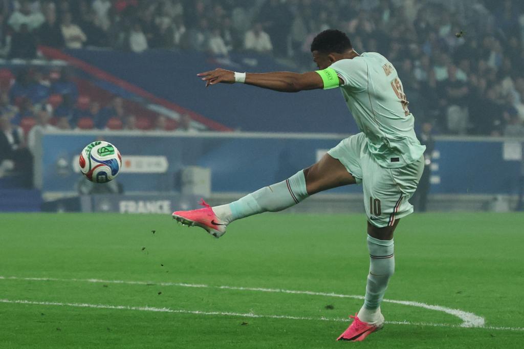 Mbappé volleys the ball against Northern Ireland