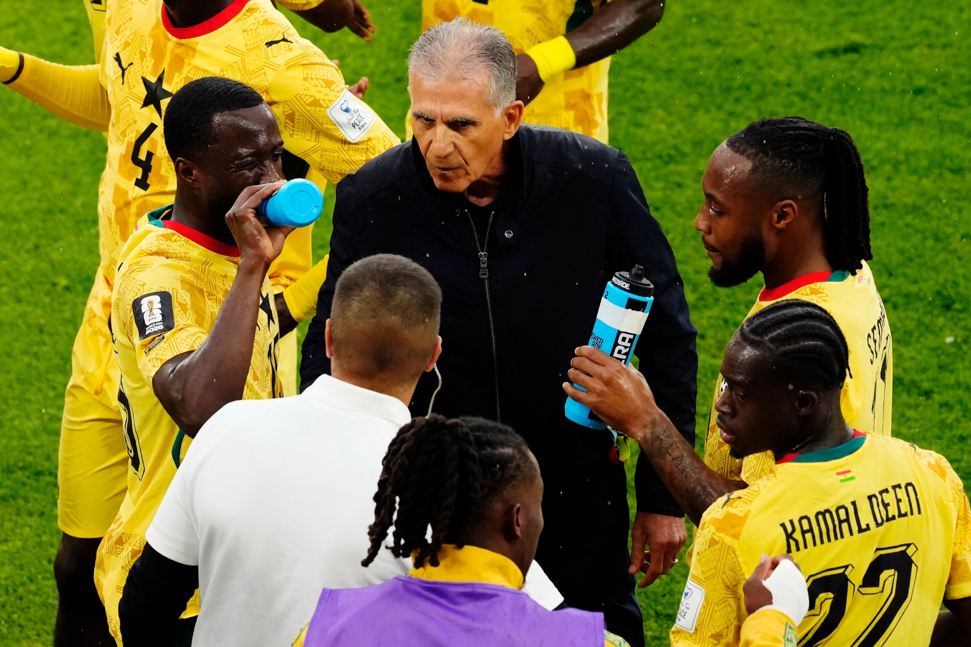 Carlos Queiroz talks to the Ghana players during a break.