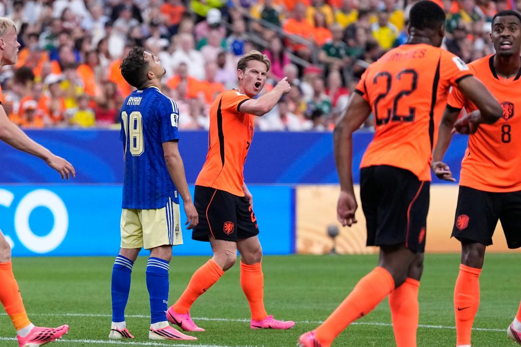 Frenkie de Jong gestures in the match against Sweden.