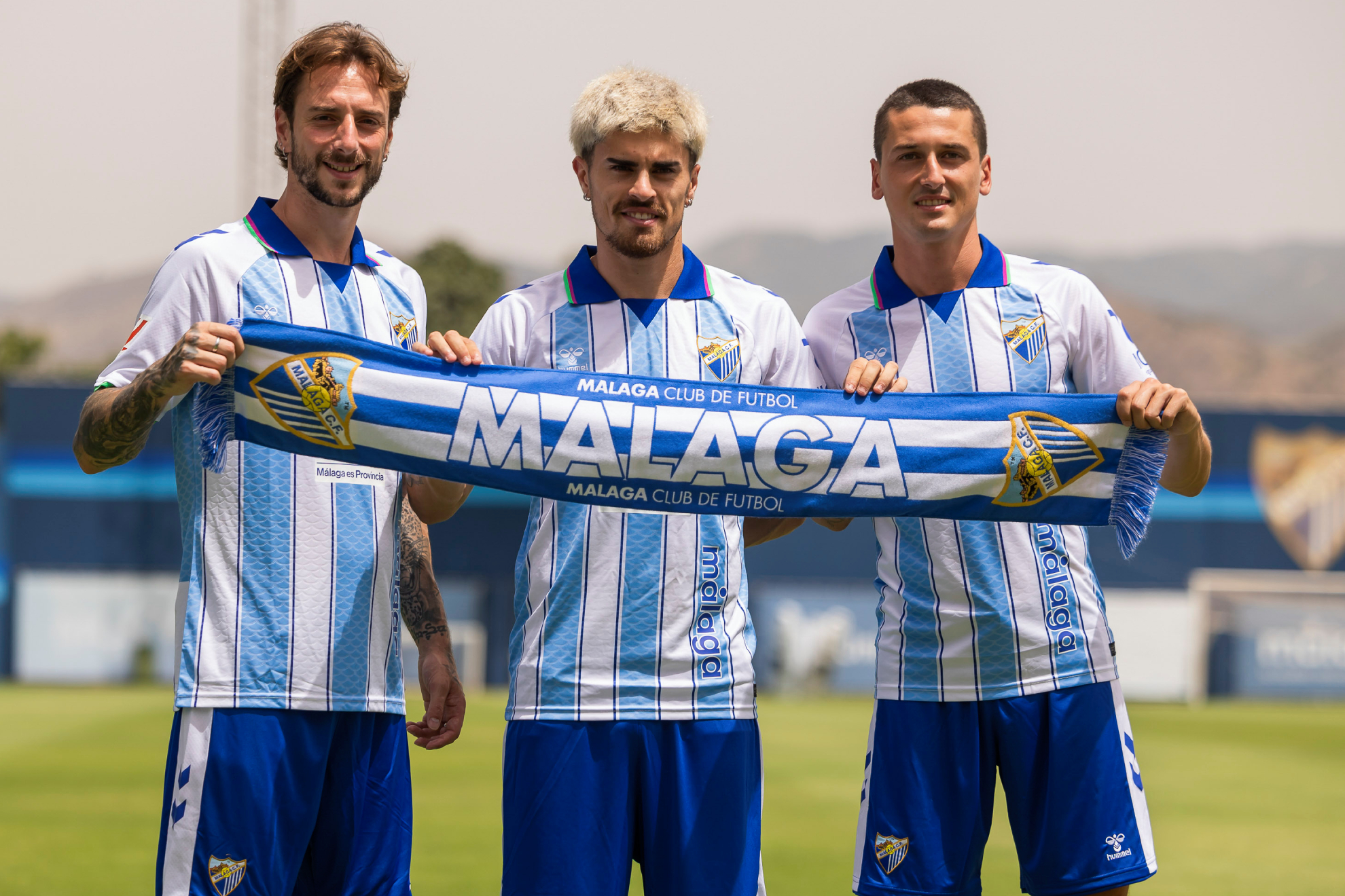Fernando Calero, Juan Cruz y Carlos Dotor durante su presentación con el Málaga