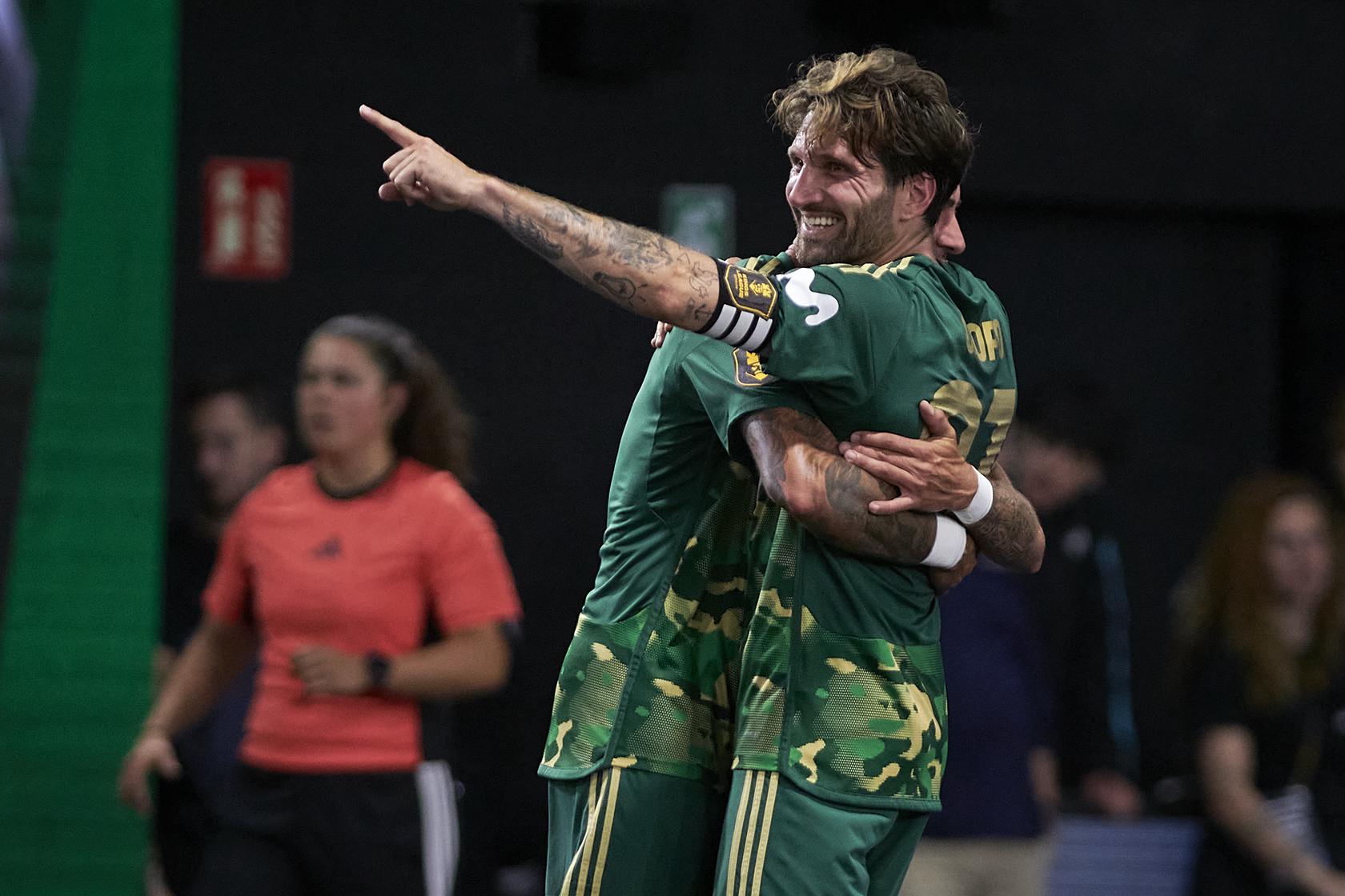 Carles Planas celebrates a goal with Los Troncos