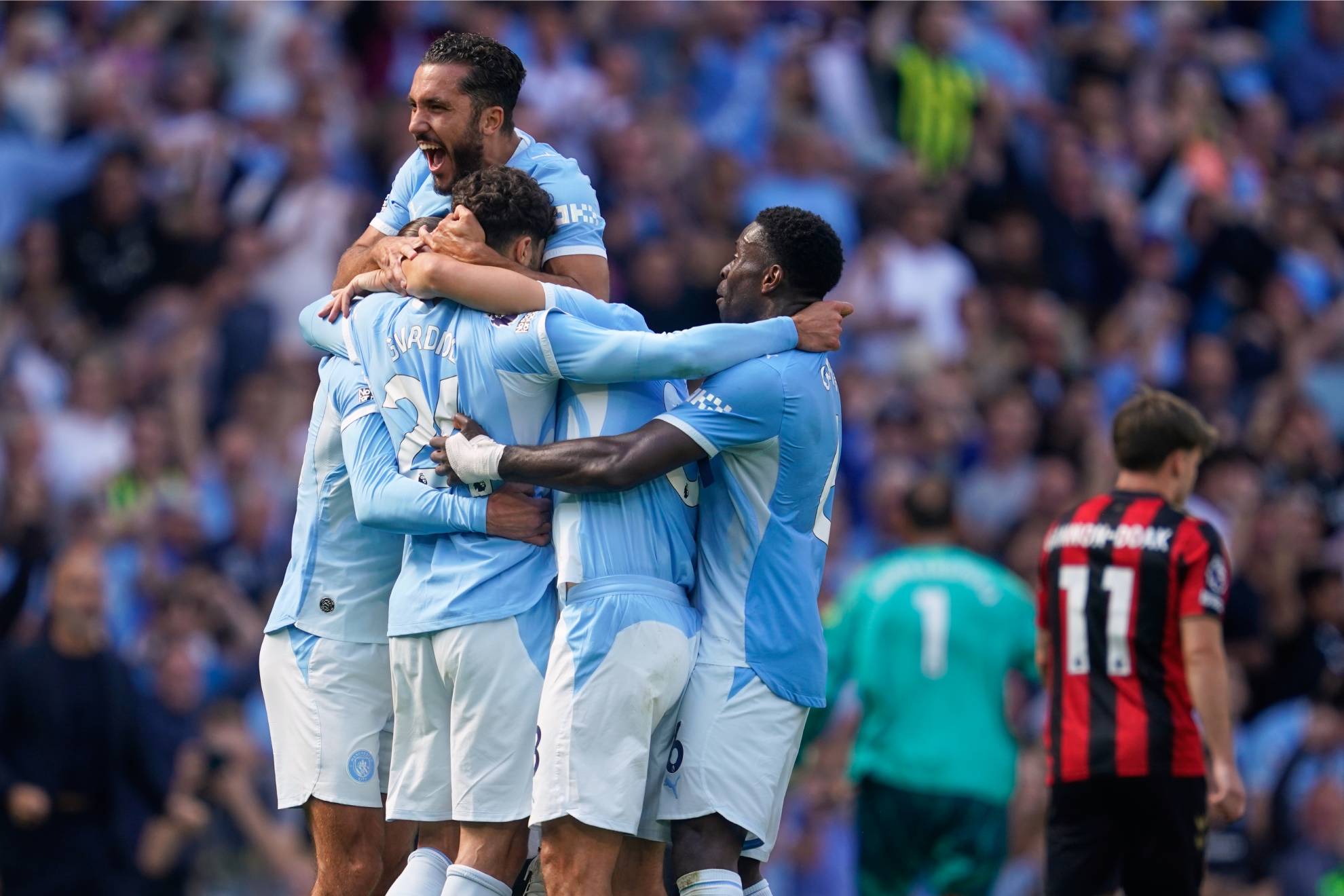 Los jugadores del City celebran el triunfo. Dave Thompson