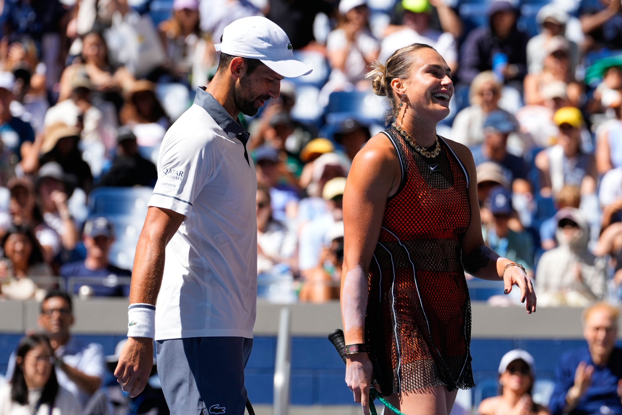 Djokovic y Sabalenka, en el partido.