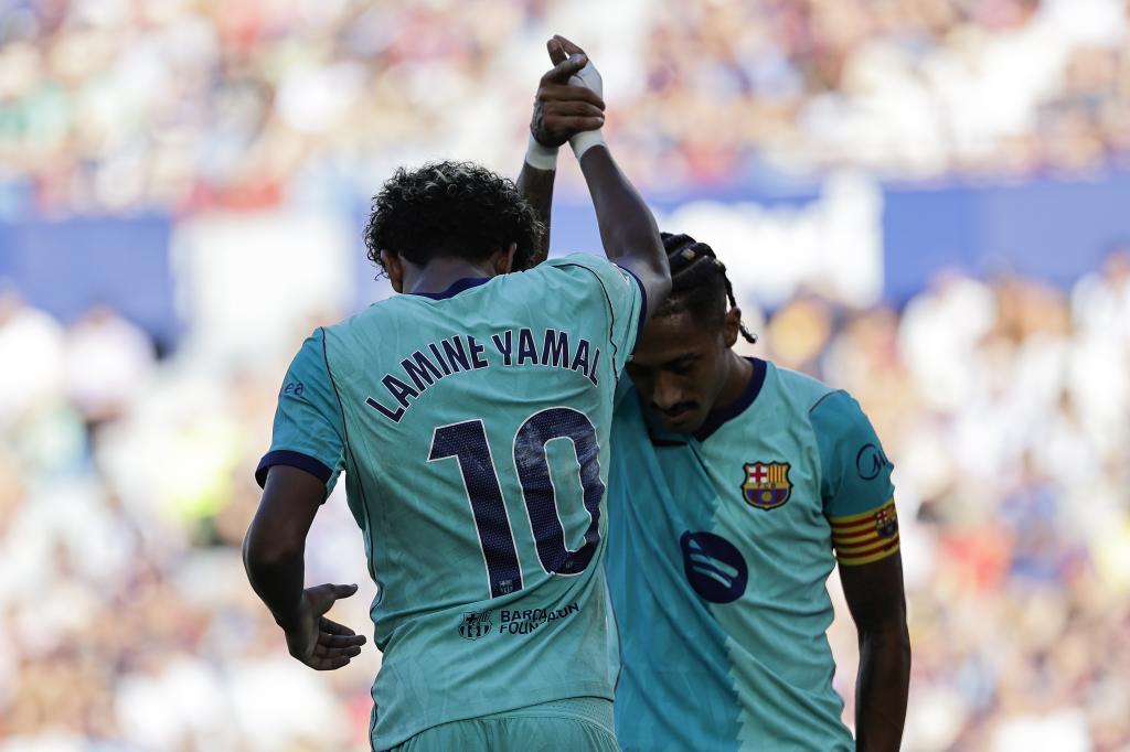 Lamine y Raphinha.