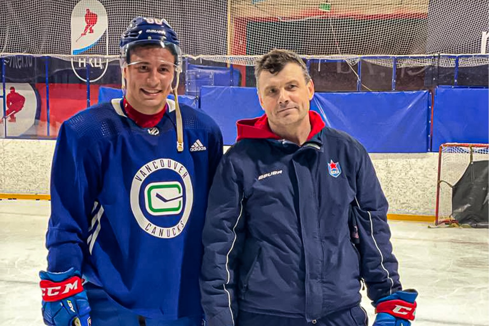 Andrei Kuzmenko junto a su padre Alexander.