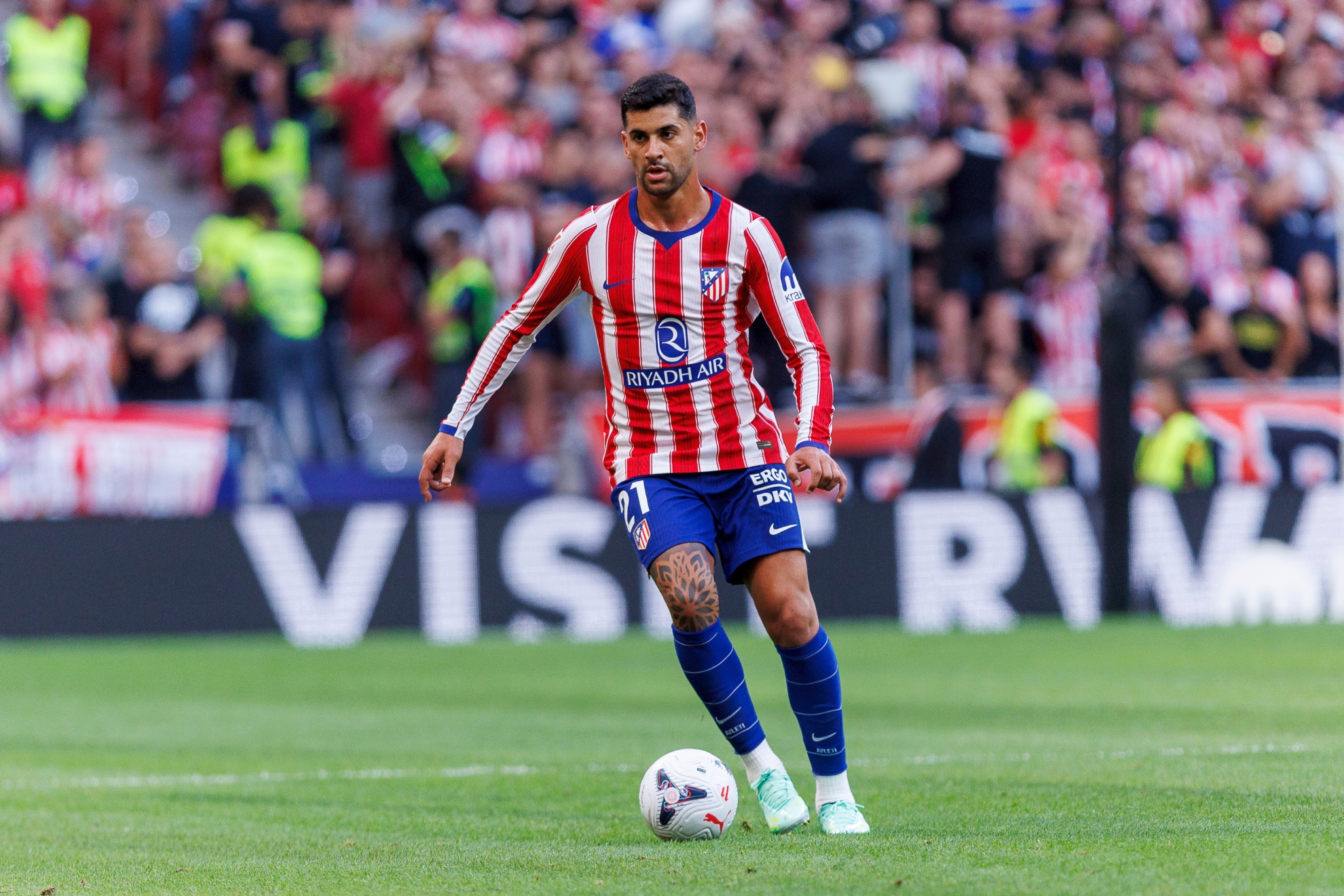 CUTI ROMERO, EN UN PARTIDO DEL ATLÉTICO.
