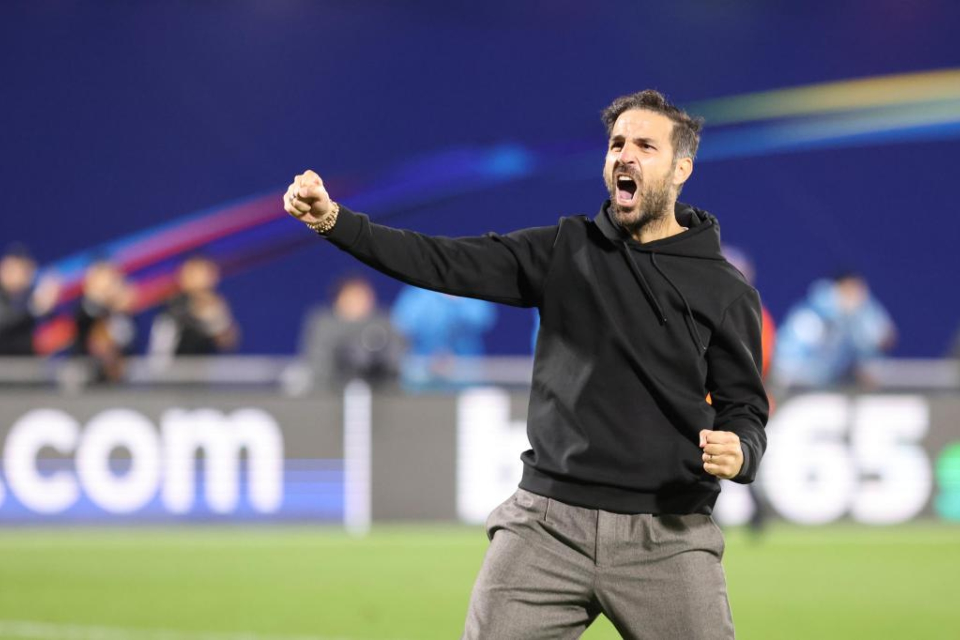 Cesc Fàbregas celebra la victoria sobre el Manchester United. EFE