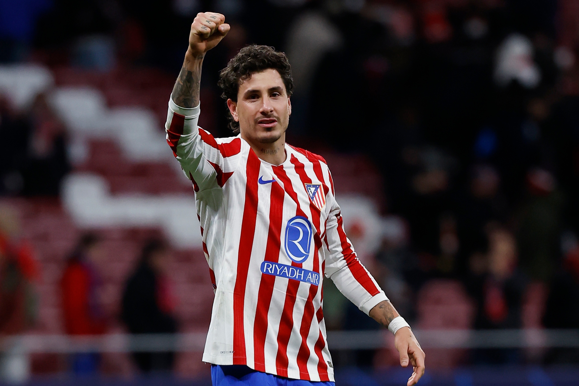 GIMÉNEZ CELEBRA UN TRIUNFO CON EL ATLÉTICO. CHEMA REY