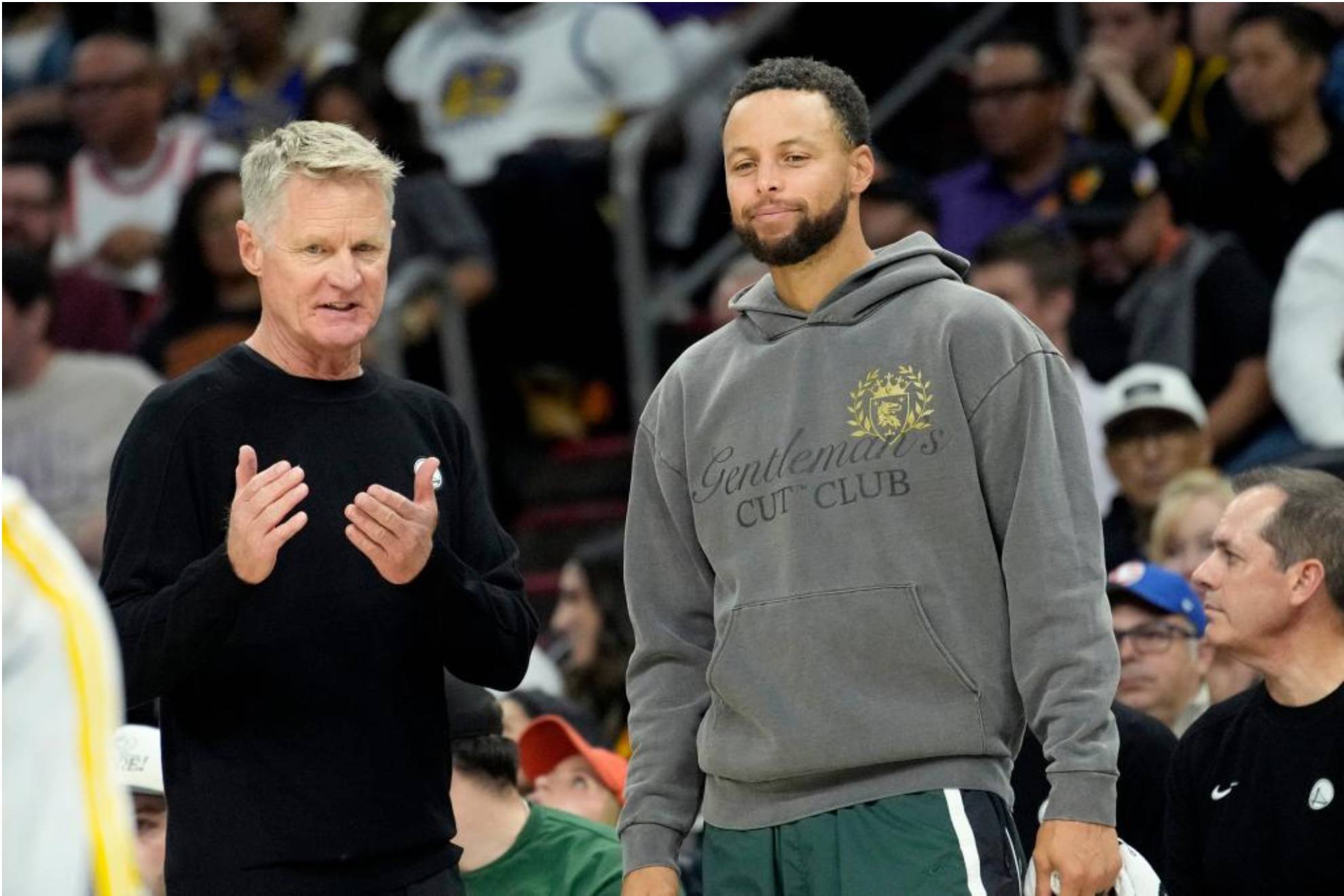 Stephen Curry atiende a las indicaciones de Steve Kerr.
